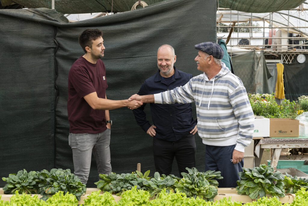 Simon Rogan and Oli Marlow with local farmers.