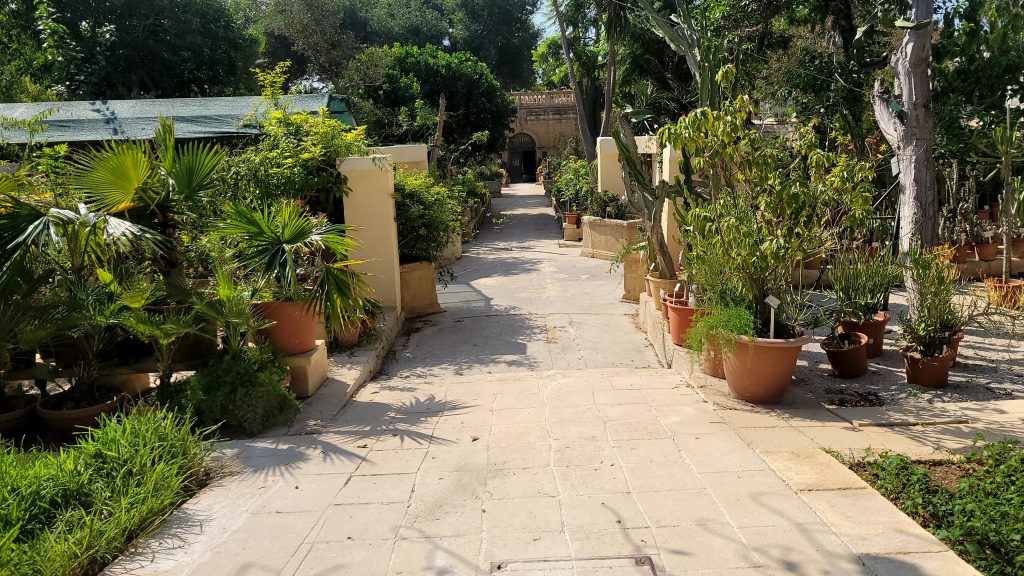 The main villa pathway of the Argotti Botanic Gardens.