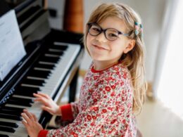 a girl at a piano