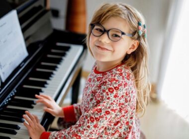 a girl at a piano