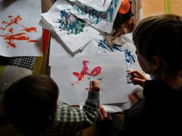 a child and painted characters