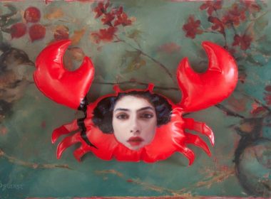 A mixed media painting with an integrated inflatable crab