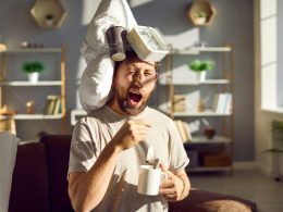 A man with an alarm clock taped to his head!