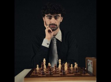 A young man and a chessboard