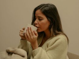 A woman with a hot drink
