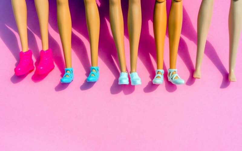 a series of Barbie legs with shoes