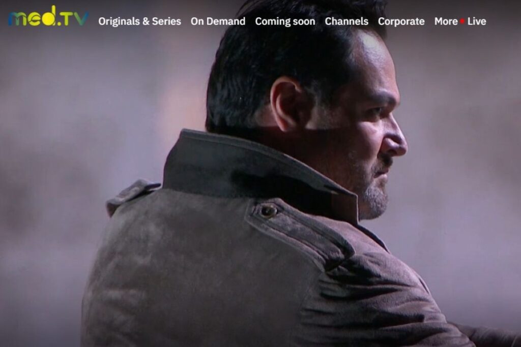 A man on screen