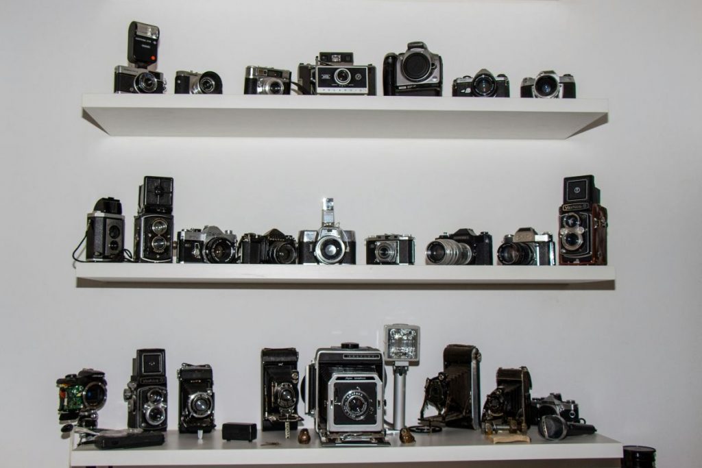 shelves of cameras