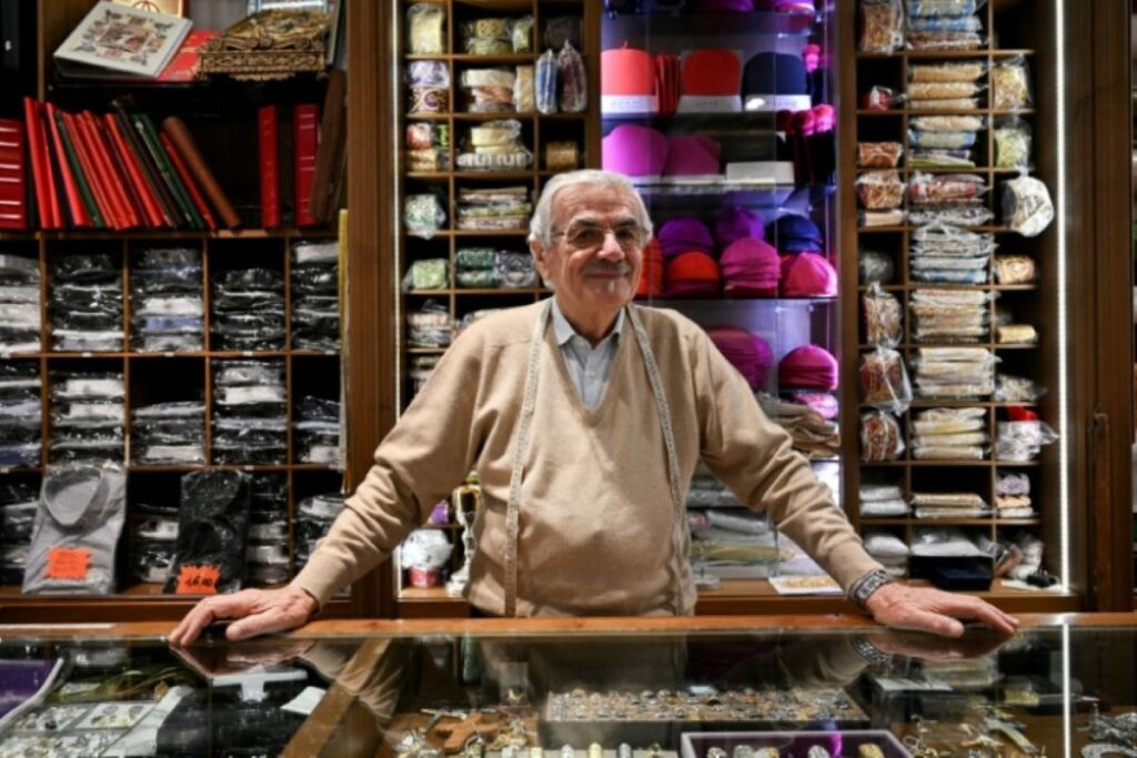 an old Italian tailor in his shop