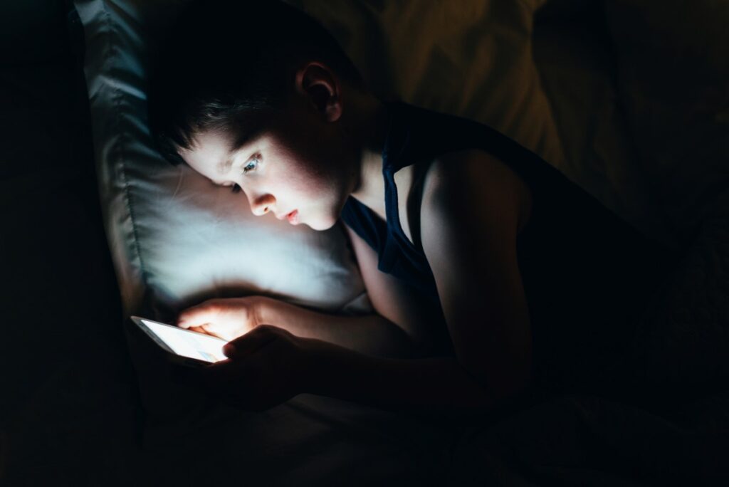 Child looking at mobile