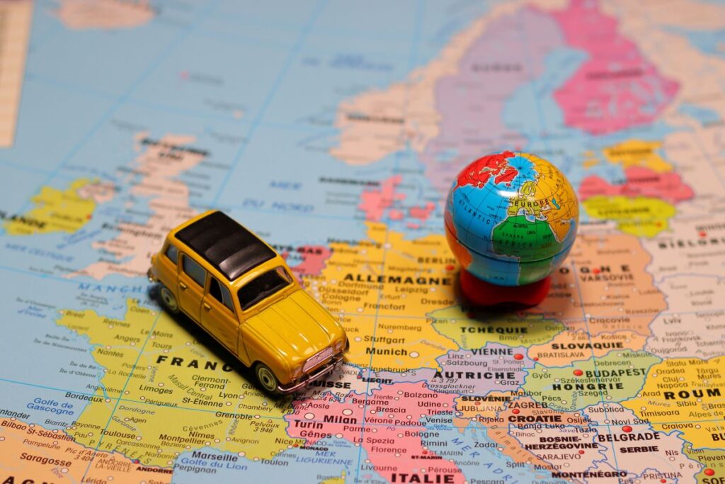 a map with a mini-globe ad car