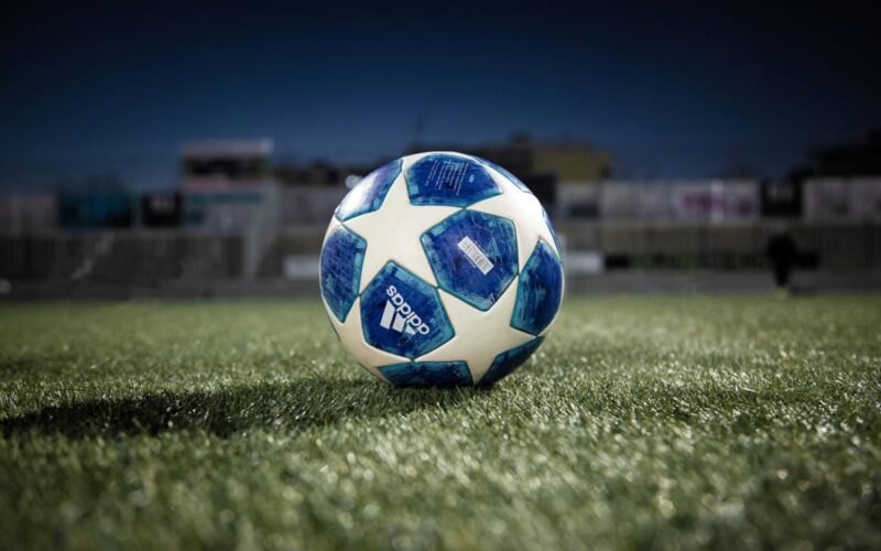 A photo of a football in a stadium