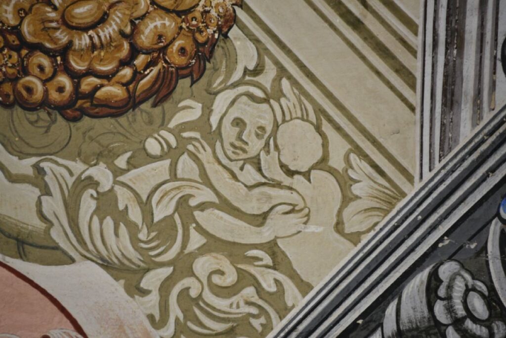 a detail of art on a wall