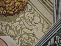 a detail of art on a wall