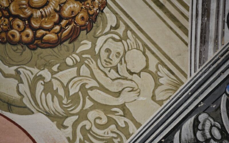 a detail of art on a wall