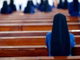 Nuns at prayer in a church