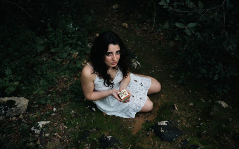 a woman in a meadow