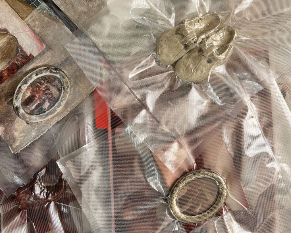 shoes and pictrue frames covered in plastic