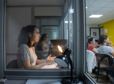 a woman in an interpreting booth