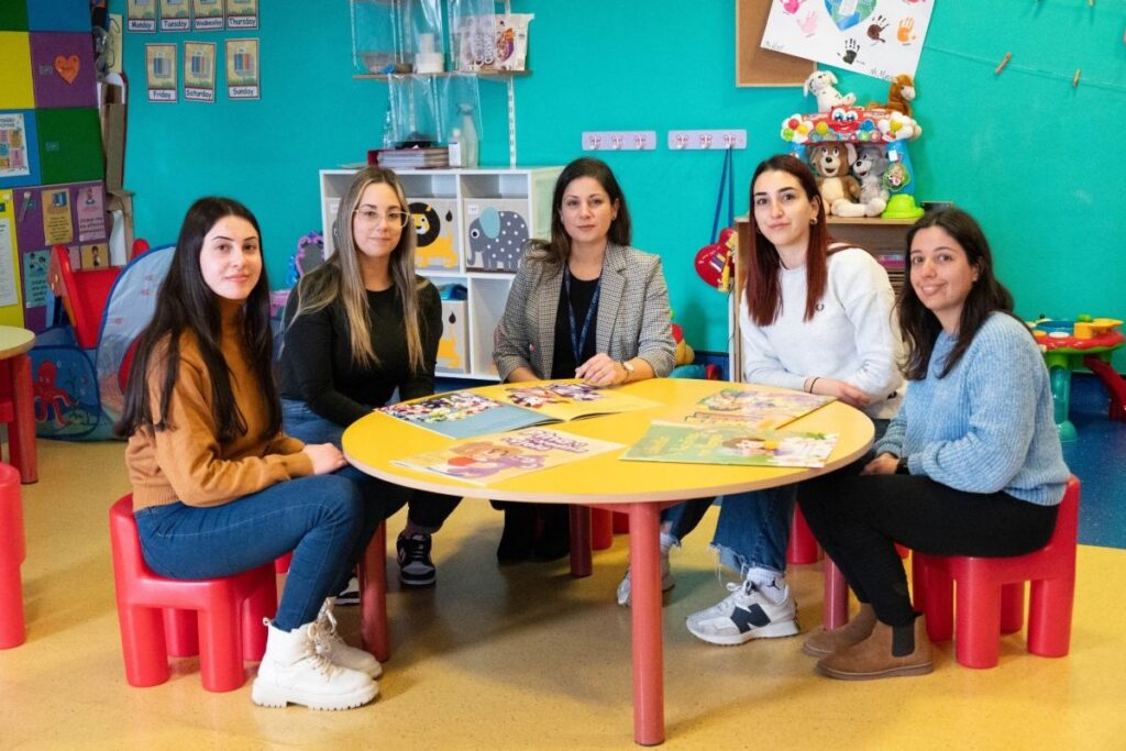 Dr Melanie Darmanin and the student authors of four new children's books in Maltese