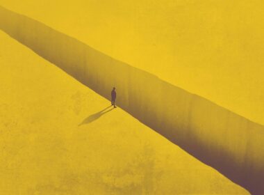 a man on the edge of a chasm in the ground