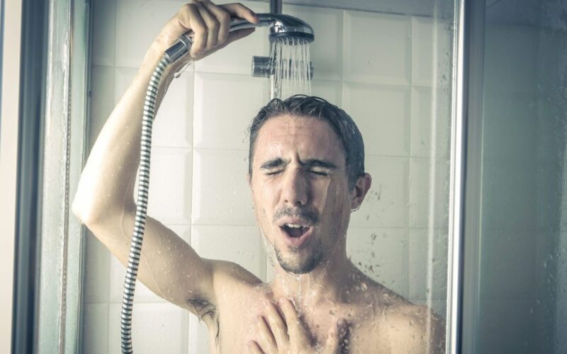 A man in a cold shower