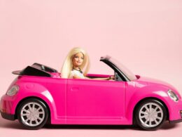 Barbie in a pink car