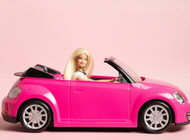 Barbie in a pink car