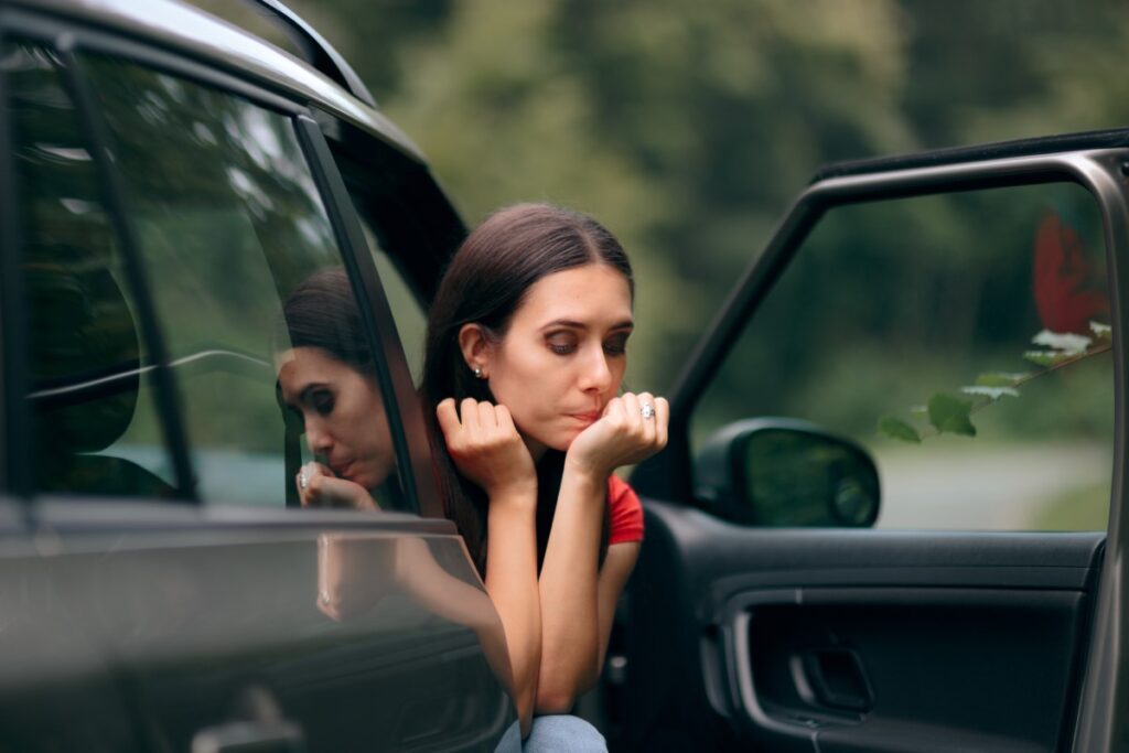 Woman feeling sick in car