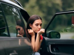 Woman feeling sick in car