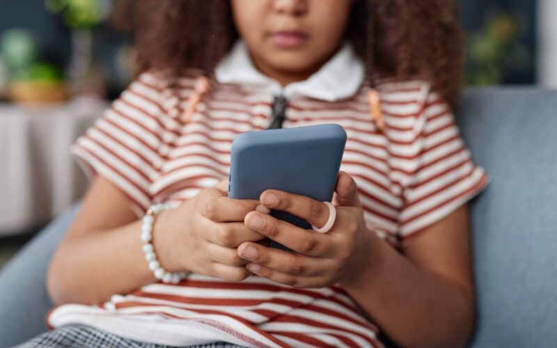 Girl reading mobile