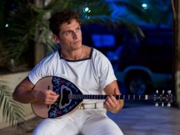 David Tucci with a musical instrument