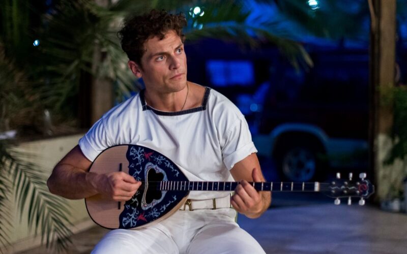 David Tucci with a musical instrument