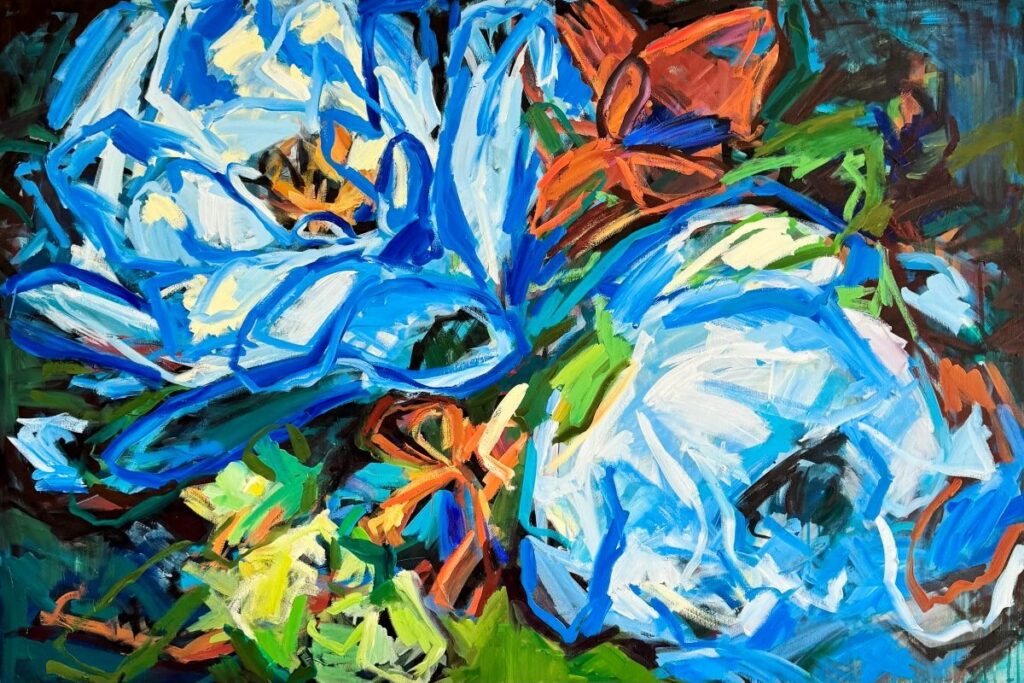 A vivid blue floral painting