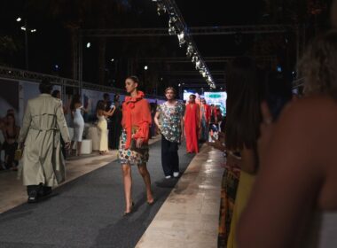 Models wearing outfits from the latest Charles and Ron collection.