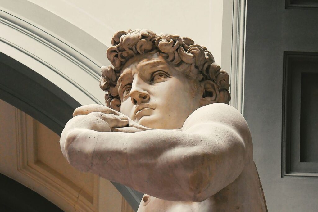 A close-up of a Roman sculpture with a doubtful expression