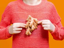 a person holding some ginger roort