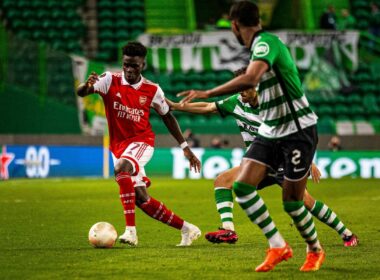 Footballers in red and green