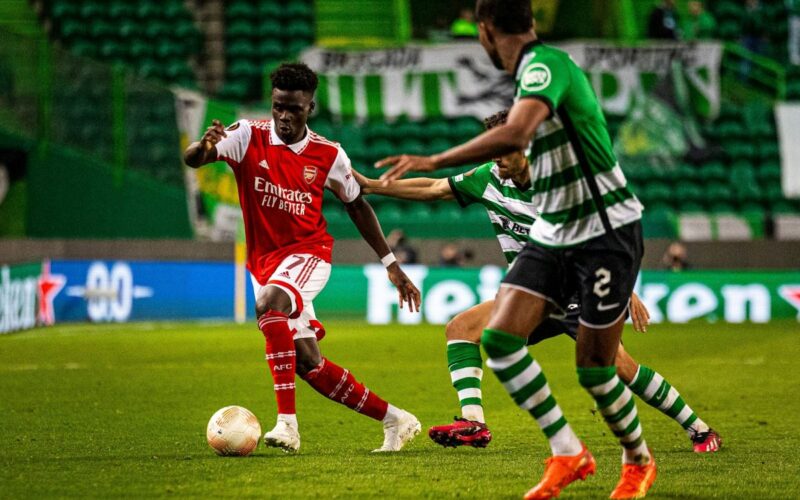 Footballers in red and green