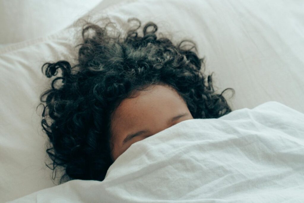 a person under a duvet