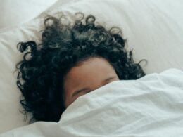 a person under a duvet