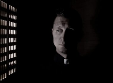 A priest in a confessional