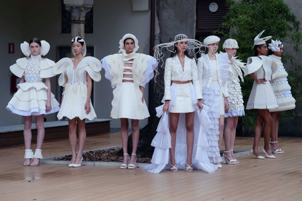 A line-up of models wearing the collection