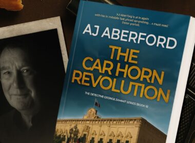 A photo of AJ Aberford & the cover of The Car Horn Revolution