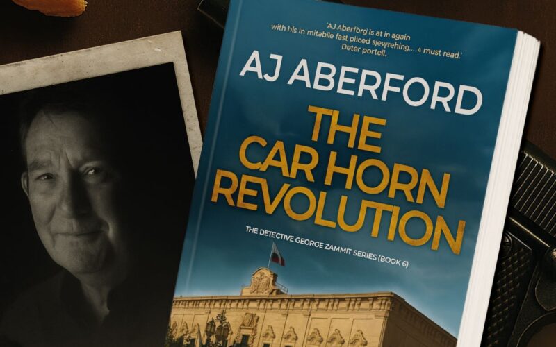 A photo of AJ Aberford & the cover of The Car Horn Revolution