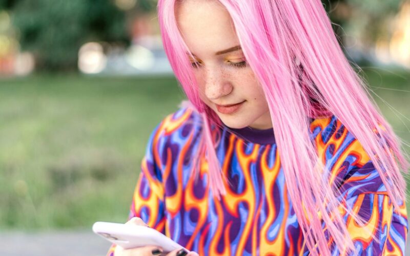 a girl with pink hair