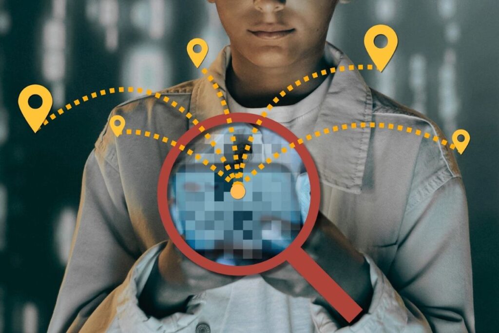 A person looks at a phone that is tracking them