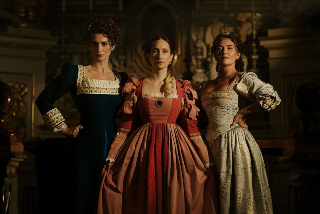 Three women in 17th century dress
