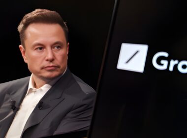 Ekon Musk with logo of Grok