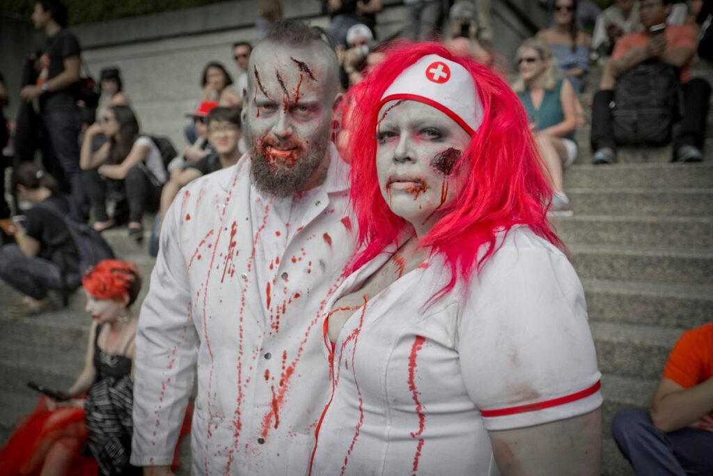 Two people dressed as Zombies